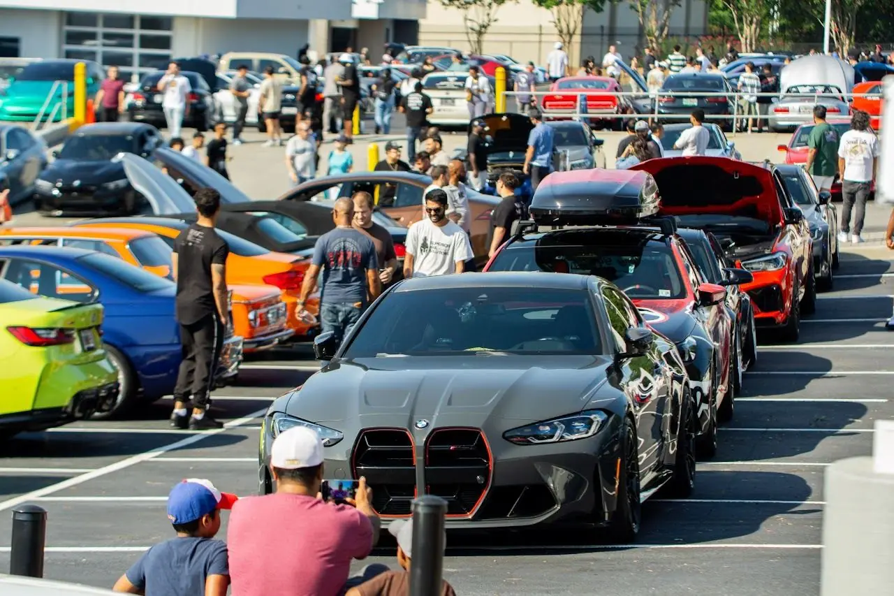 Crowd and cars at a Bimmers & Coffee meet